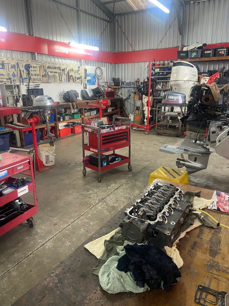 Honda Marine service centre workshop with engines and tools